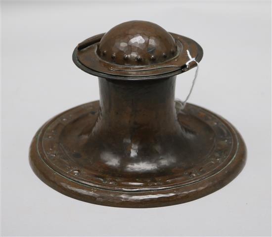 A Jesson Birkett & Co. Arts & Crafts copper inkwell with applied pin-head rivet decoration 13cm